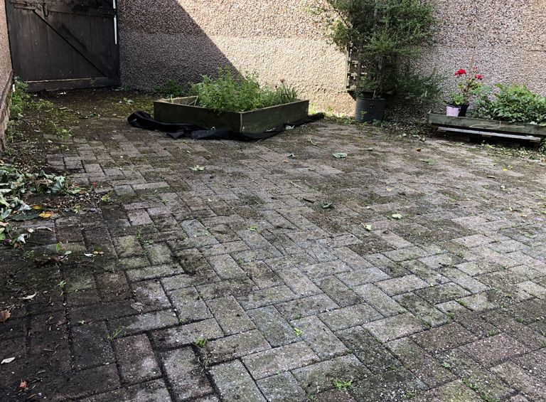Before patio pressure wash Conwy